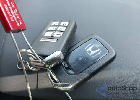 2022 Honda Odyssey Touring z USA, uszkodzony, nr VIN 5FNRL6H86NB038451